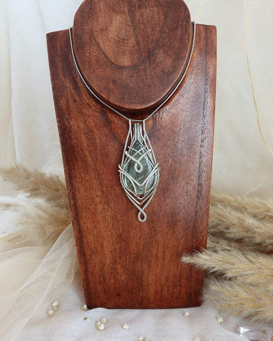 Silver-plated labradorite wirewrap pendant showing iridescent flash