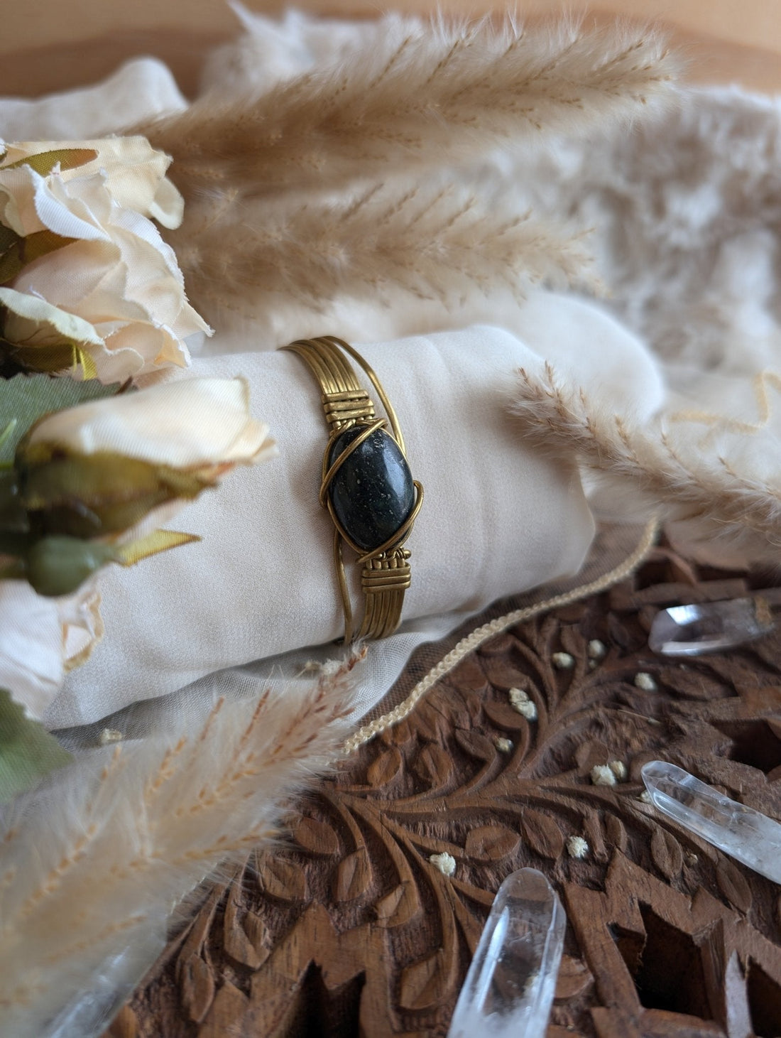 Dark jade wirewrap bracelet on brass wire, the heart stone of the woman who leads with love