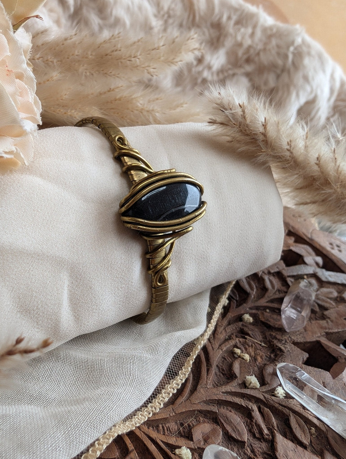 Blue tiger eye bracelet showing rare midnight blue color, the calming stone of the brave-hearted woman