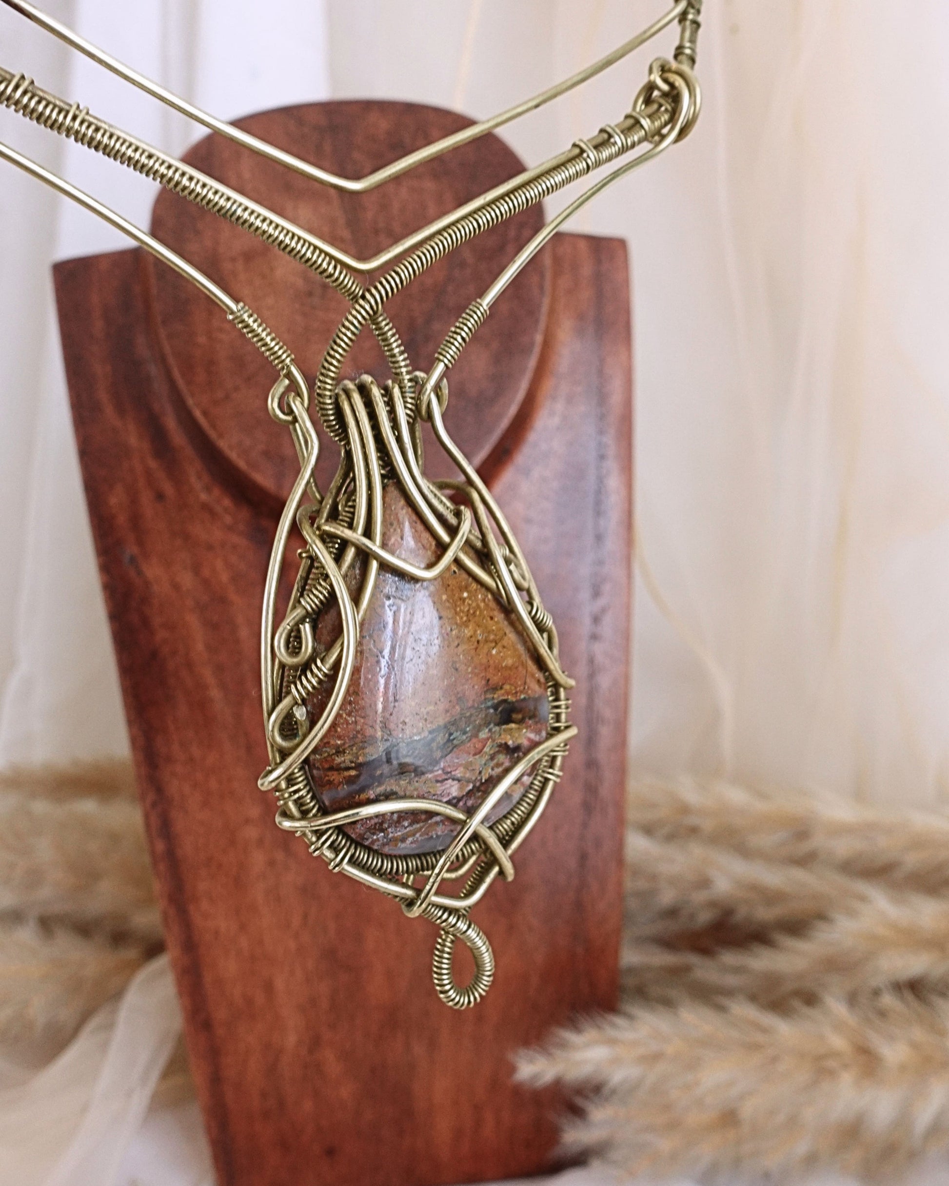 Detail of intricate brass wirework on Ocean Jasper VÏ pendant