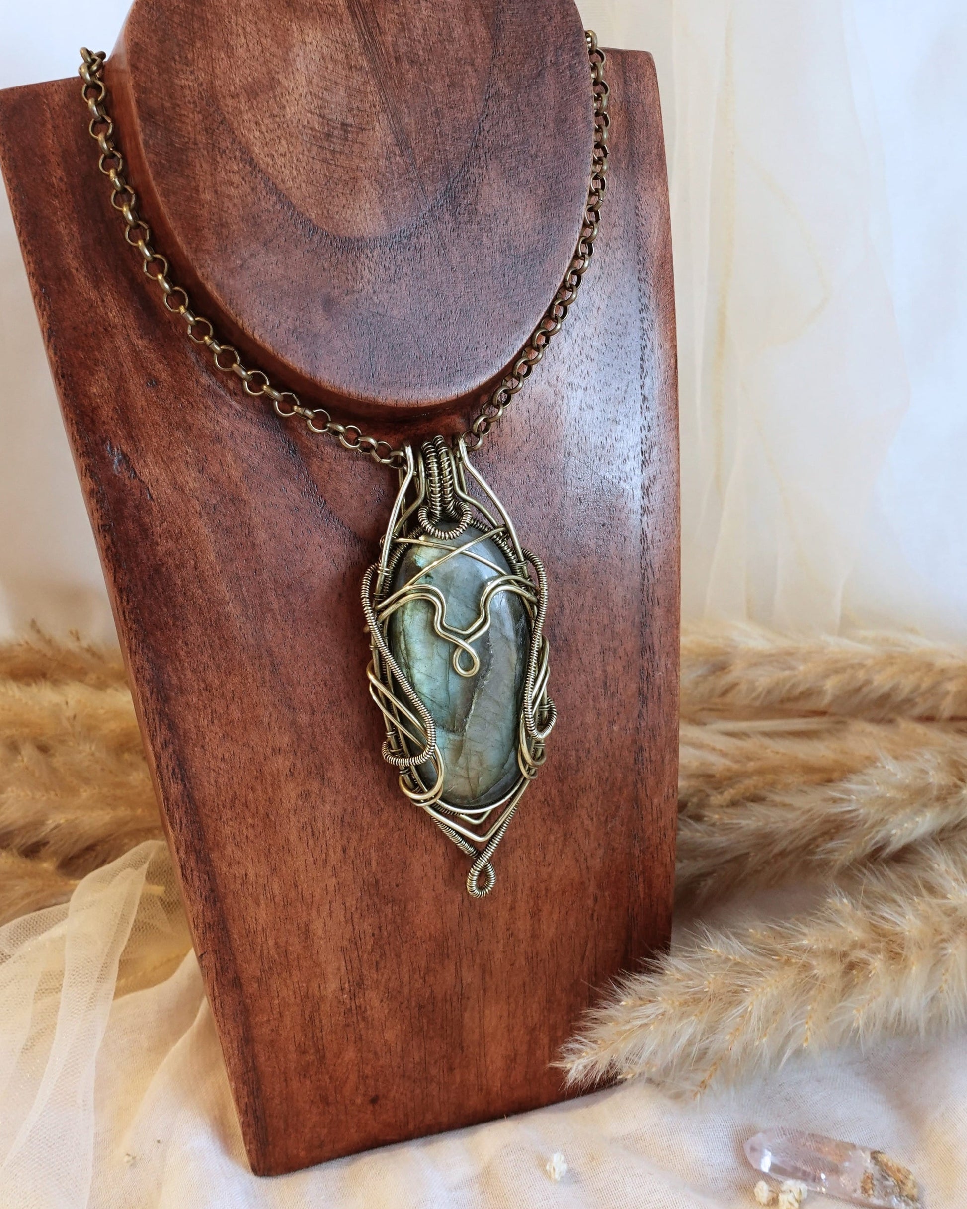 Handmade bold labradorite necklace with brass wirewrap pendant — front view