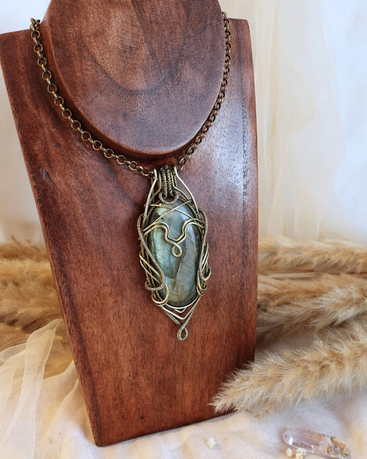 Handmade bold labradorite necklace with brass wirewrap pendant — front view
