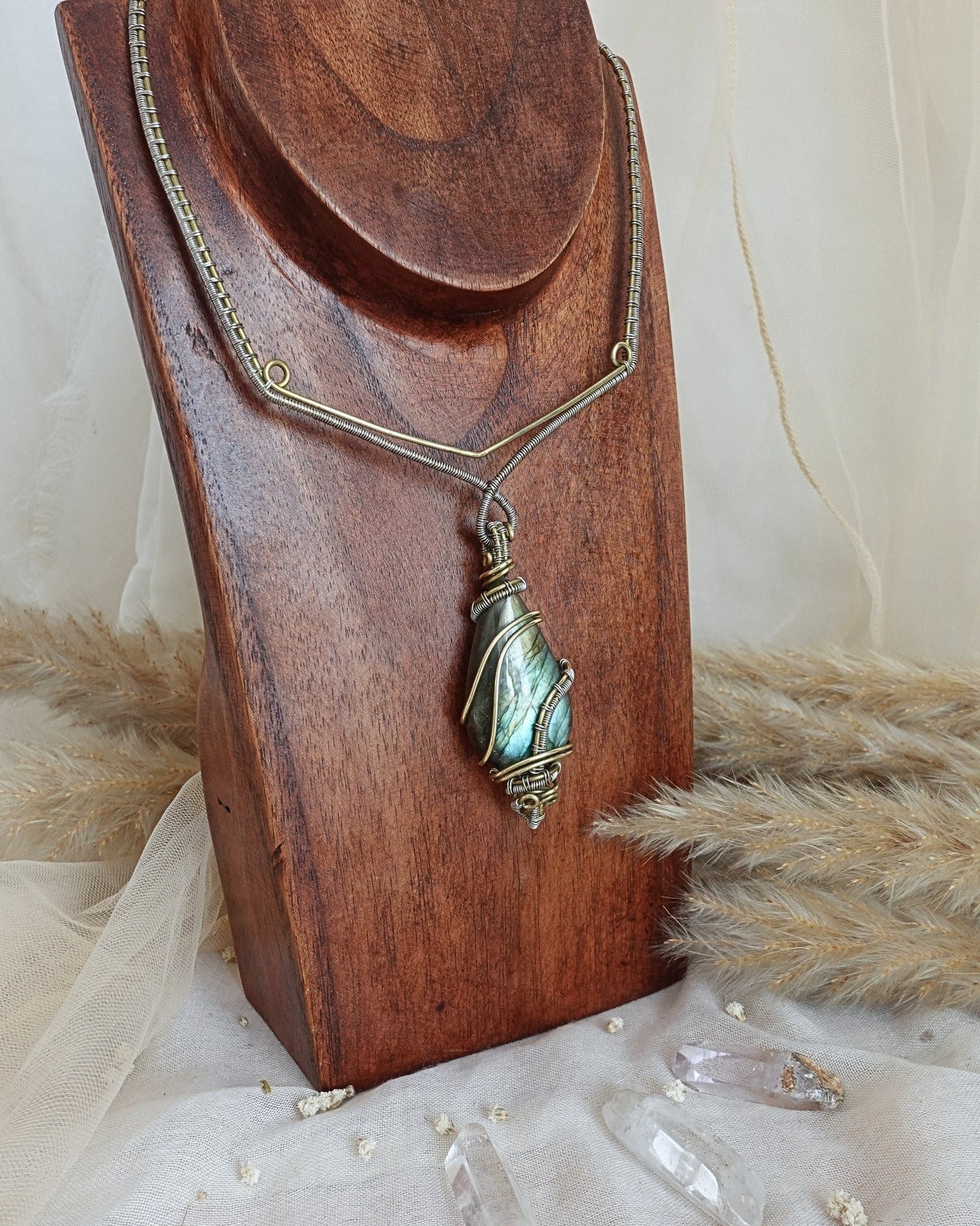 Delicate labradorite wirewrap pendant showing soft iridescent flash