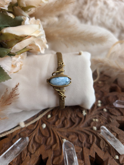 Side view of ZÏ larimar bracelet in adjustable brass wire
