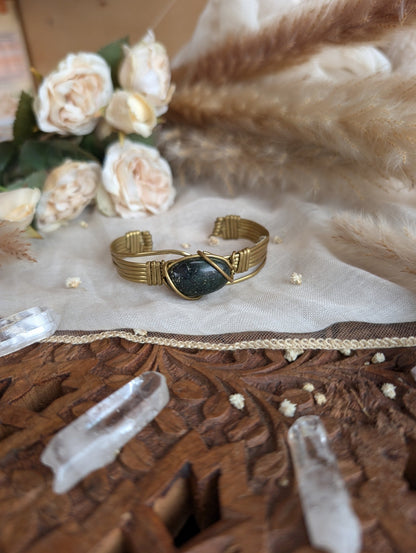 Dark jade bracelet showing deep green color of the stone