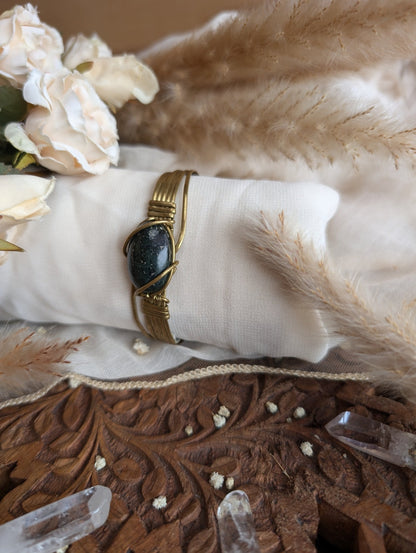 Dark jade bracelet styled on wrist — Rikst Jewelry handmade piece