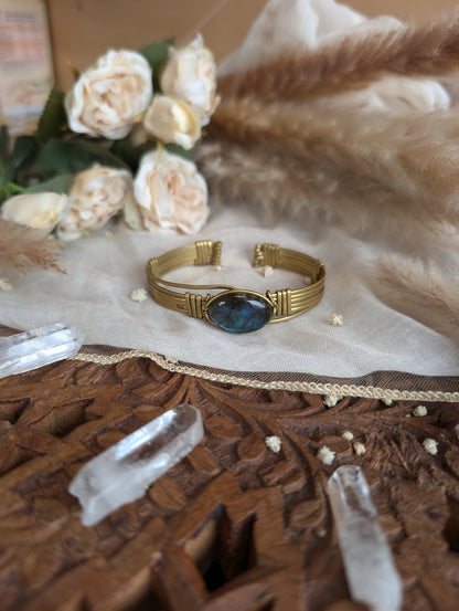 Labradorite bracelet showing iridescent flash on the stone