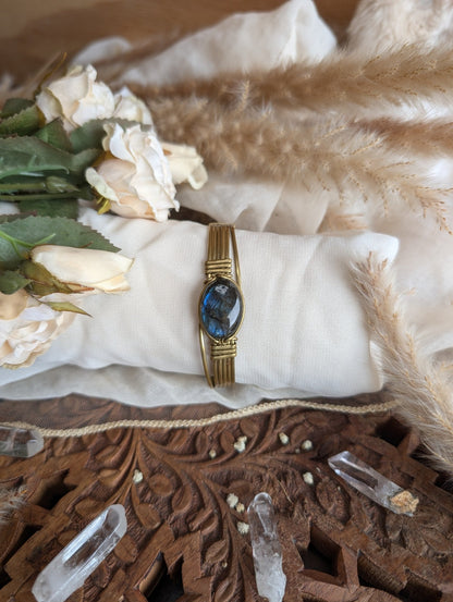 Side view of labradorite bracelet wrapped in pliable brass wire