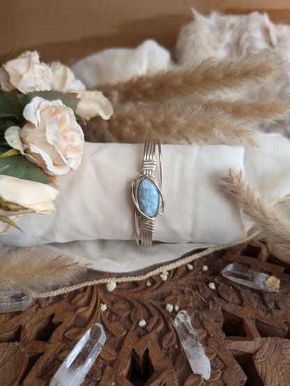 Side view of larimar bracelet in adjustable silver-plated wire