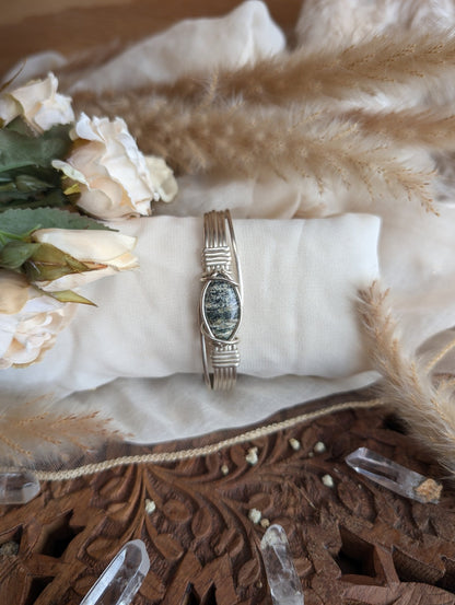 Side view of ocean jasper bracelet in adjustable silver-plated wire
