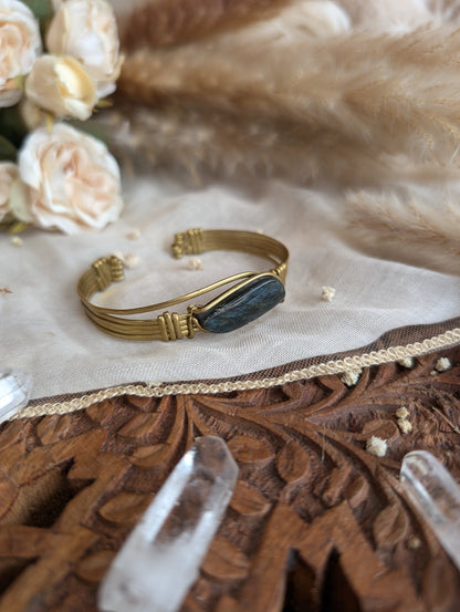 Rainbow obsidian bracelet showing iridescent reflection