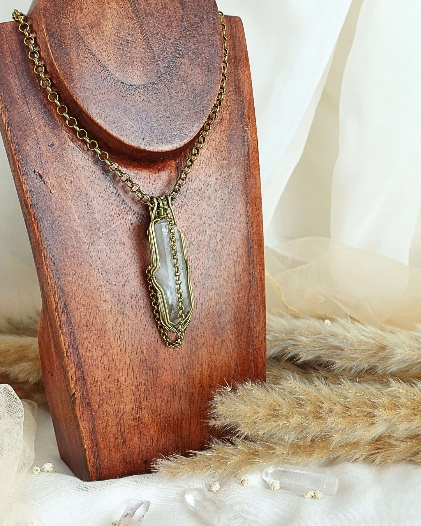 Quartz pendulum necklace styled on neck — Rikst Jewelry handmade piece