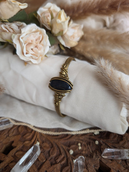 ZÏ blue tiger eye bracelet styled on wrist — Rikst Jewelry handmade piece