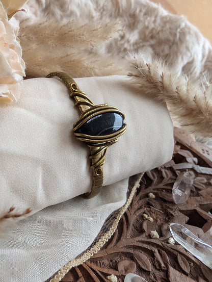 Handmade ZÏ blue tiger eye bracelet on brass wire — front view